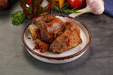 Baked beef ribs with vegetables
