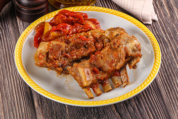 Baked lamb ribs with vegetables