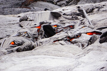 Active lava flows over old lava field in Hawaii