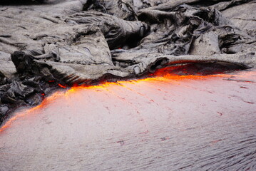 Active lava flows over old lava field in Hawaii