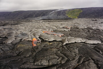 Active lava flows over old lava field in Hawaii