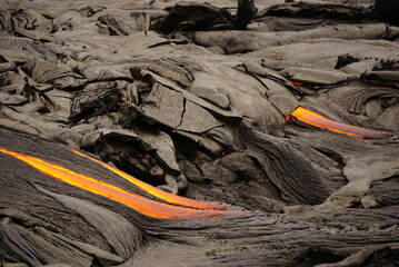 Active lava flows over old lava field in Hawaii