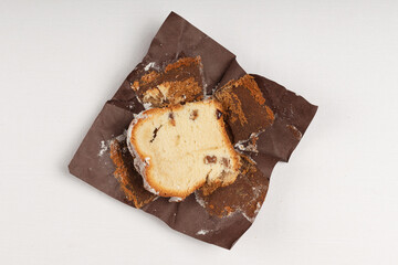 Detailed view of a rustic sweet bread slice with raisins and a golden crust.