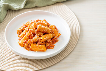 Rigatoni pasta bolognese with cheese