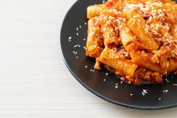 Rigatoni pasta bolognese with cheese