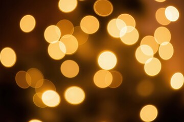 Obraz premium Aesthetic Photograph of Soft, Blurry Golden Lights Creating a Warm and Inviting Atmosphere Ideal for Celebrations and Cozy Gatherings During the Festive Season