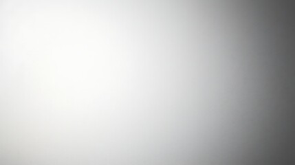 A smooth gradient transitioning from light to dark creates a subtle and calming background effect.