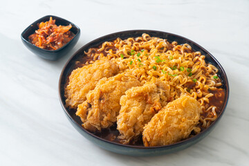 Korean instant noodles with fried chicken or Fried chicken ramyeon