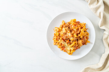 homemade macaroni bolognese with cheese