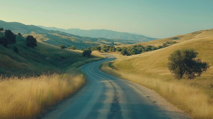Winding road through scenic summer hills.