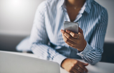 Business, contact and phone in hand of woman at office for communication, networking or update. App, social media and text message with employee in workplace to check mobile calendar or schedule