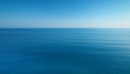 Obraz premium Smooth gradient: deep blue to light teal evokes ocean tranquility. Calming & fluid color wash. Ideal for serene backgrounds & ocean-themed designs.