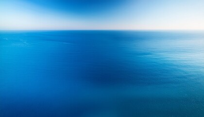 Obraz premium Smooth gradient: deep blue to light teal evokes ocean tranquility. Calming & fluid color wash. Ideal for serene backgrounds & ocean-themed designs.