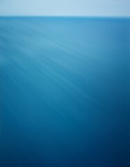 Smooth gradient: deep blue to light teal evokes ocean tranquility.  Calming & fluid color wash. Ideal for serene backgrounds & ocean-themed designs.


