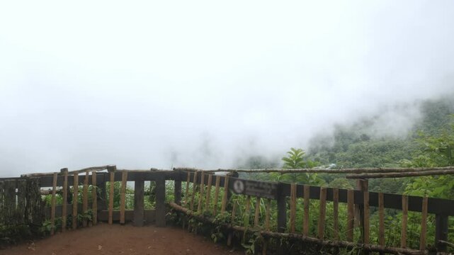 view from doi pui view point among the mountain range hill with white cloud and fog over among mountain in winter daytime