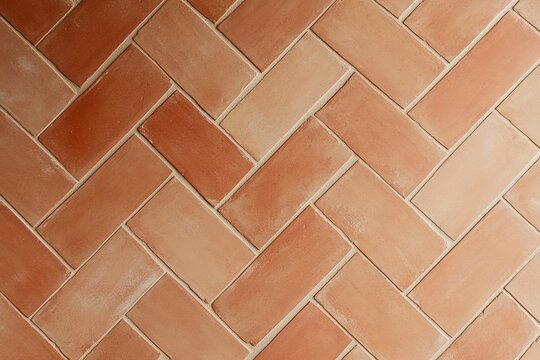 Herringbone terracotta tile pattern texture on floor or wall