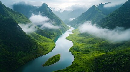 A peaceful river winding through a lush valley, with clouds resting on the surrounding peaks