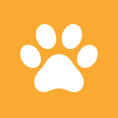 White paw print on orange © riedoak
