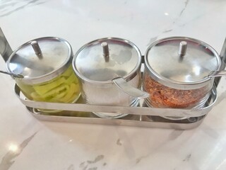 Garnish noodles seasoning Thai style, vinegar sugar and chili.