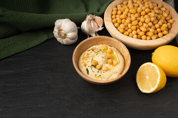 Hummus in bowl, houmous dip, chickpea humus tahini sauce, middle eastern spread