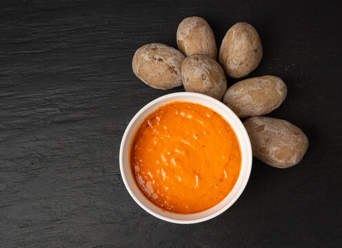 Red mojo rojo and green mojo verde sauces, traditional Tenerife dips, mojo picon dressing