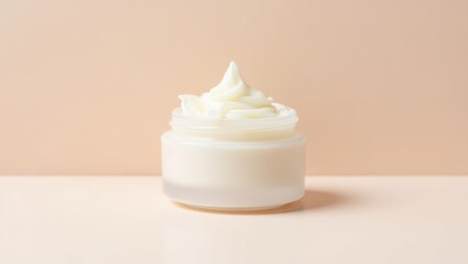 Melting Balm. White cream jar with lotion swirl on beige background sk