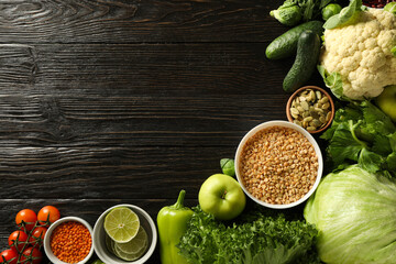 Set of vegan protein products on wooden background, space for text