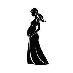 Fototapeta premium Charming expectant mother wearing long dress softly touching her belly