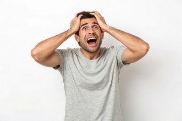 Fototapeta premium An Expressive Young Man Exhibiting a Range of Emotions in a Captivating Portrait