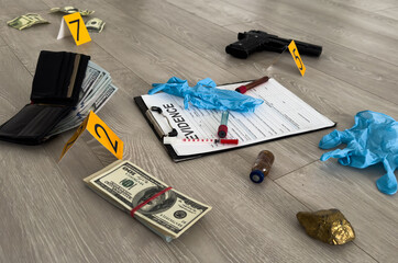 High contrast image of a crime scene with gun and markers on the floor