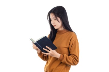 Young Asian woman posing standing holding in hands reading book isolated on white background with clipping path.