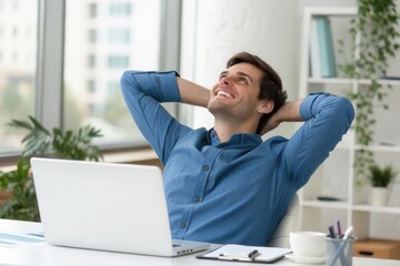 A Relaxed Young Man Enjoying a Moment of Tranquility in His Modern Workspace
