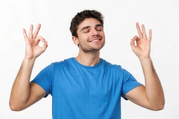 Fototapeta premium A Joyful Young Man Practicing Mindfulness with a Calm Expression and Peaceful Gaze