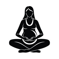 Peaceful pregnant woman meditating while sitting cross legged silhouette