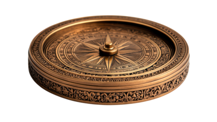 Ornate antique compass resting on a flat surface, showcasing intricate engravings and a vintage aesthetic for navigation enthusiasts