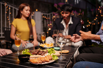 young couple having dinner at restaurant