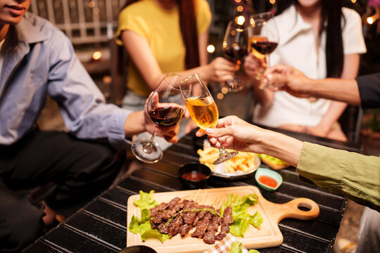 Group of people meeting for drinks Celebrate and show each other good genes happily.