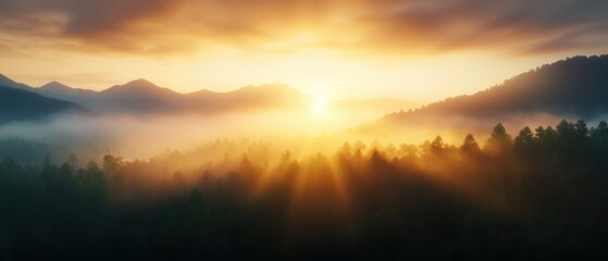 Naklejka premium Sunrise Over Mountains With Fog