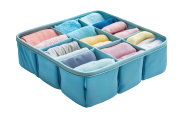 Organizing small towels and washcloths in a blue storage container with multiple compartments for neatness