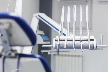 Modern Dental Clinic Equipment Focused on Professional Treatment and Care for Patients in a Bright,...