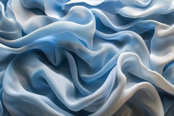 Obraz premium Abstract close-up of delicate, flowing fabric in shades of blue, creating a soft and ethereal background with a sense of gentle movement and texture.