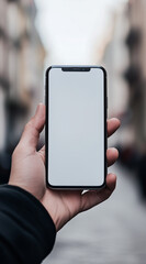 Hand holding black smartphone creen mockup