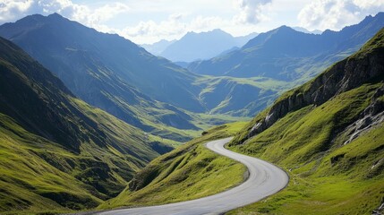 Winding alpine road with smooth asphalt, surrounded by green slopes and deep valleys, cut out from the rugged mountain