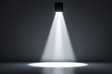 a black and white photo of a light shining from a ceiling