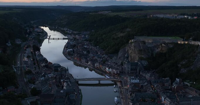 Dinant, Belgium at night, aerial drone view at the center, meuse river. Aerial view.