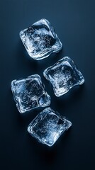 Obraz premium Crisp Ice Cubes on Dark Surface for Refreshing Beverage Ideas