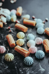 Colorful Marshmallows and Wafers on Dark Background