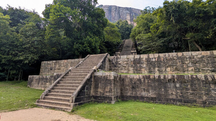 Scenic view of Yapahuwa ancient capital citadel and fortress in Sri Lanka, with steep stone steps and tall walls