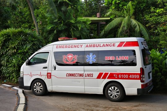 SINGAPORE CITY, SINGAPORE - MARCH 13, 2024: Emergency ambulance van Toyota Hiace parked in Sentosa Island, Singapore.
