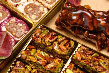 Sweet food Turkish delight on wooden background, assorted locum and candy for decorated backdrop